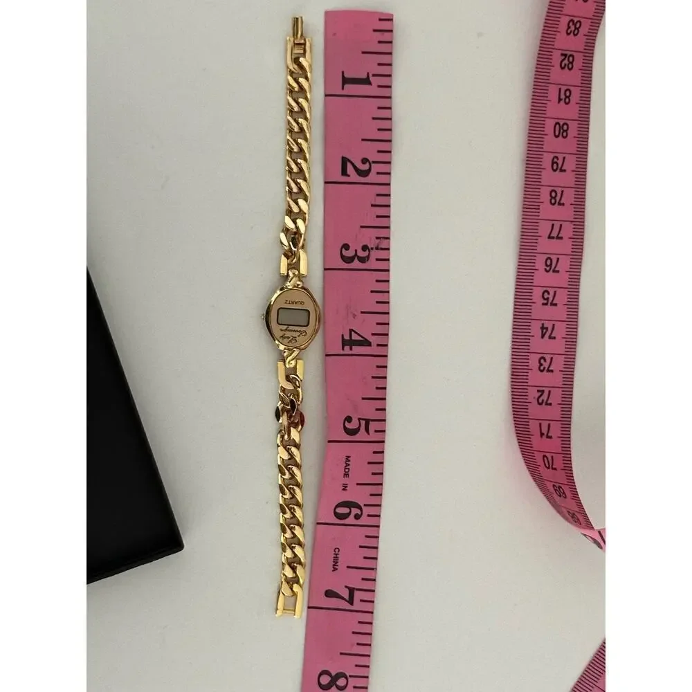 Lady Sovereign Gold Tone Band Oval Shaped Face Digital Wristwatch